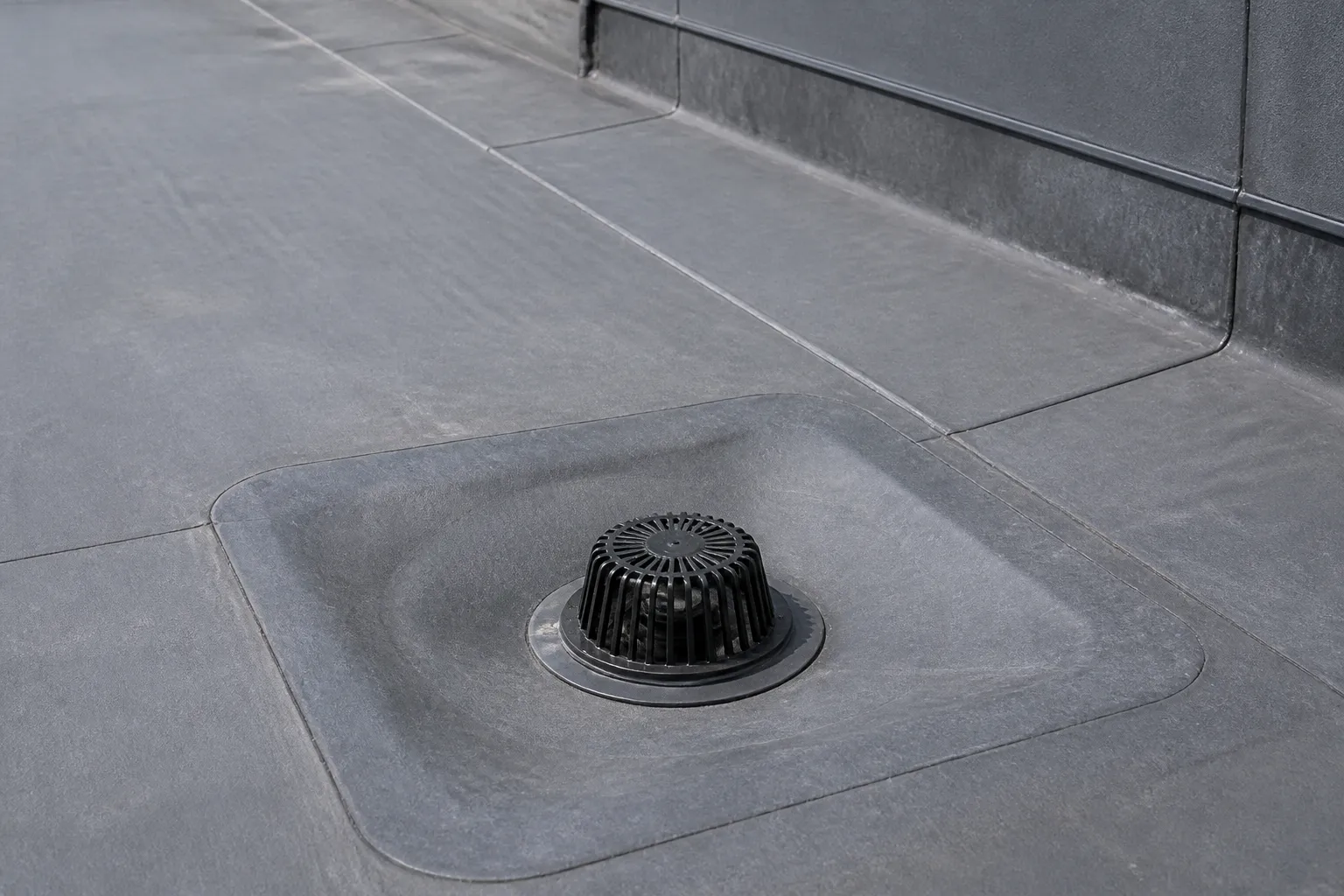Commercial low-slope roof drain and membrane flashing detail